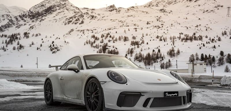 A shared Porsche 911 in the mountains
